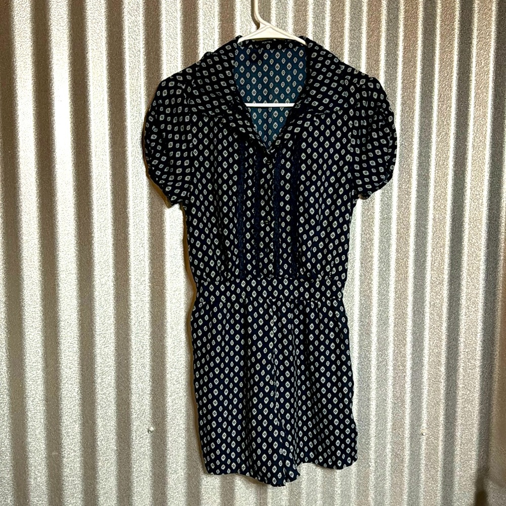 Poetry romper size small but run small more like a size 2/4